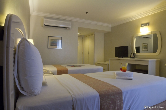 Imagen de la habitación del Hotel Riviera Mansion. Foto 2