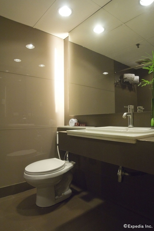 Imagen de la habitación del Hotel Riviera Mansion. Foto 13