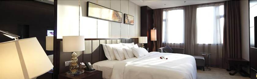 Imagen de la habitación del Hotel Riviera Ningbo. Foto 13
