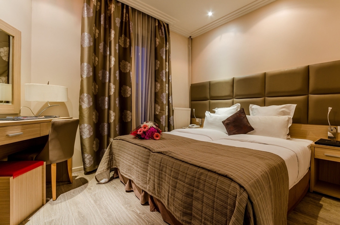 Imagen de la habitación del Hotel Riviera, París. Foto 7