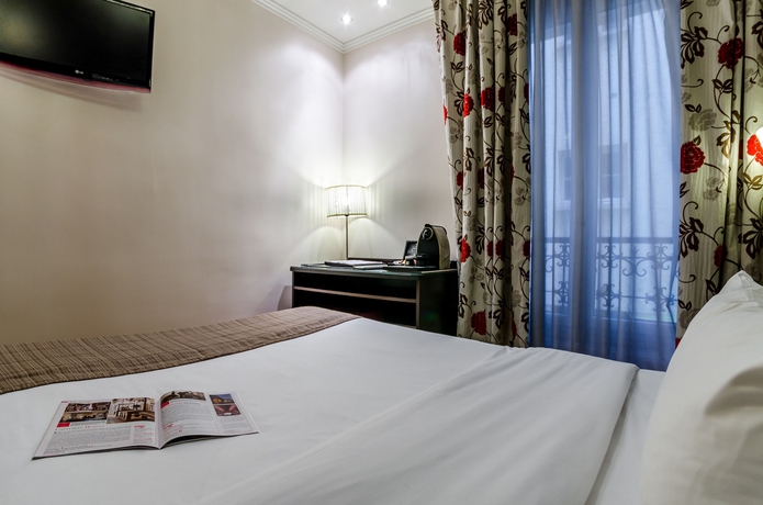 Imagen de la habitación del Hotel Riviera, París. Foto 8