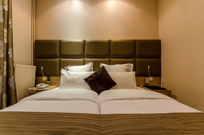 Imagen de la habitación del Hotel Riviera, París. Foto 13