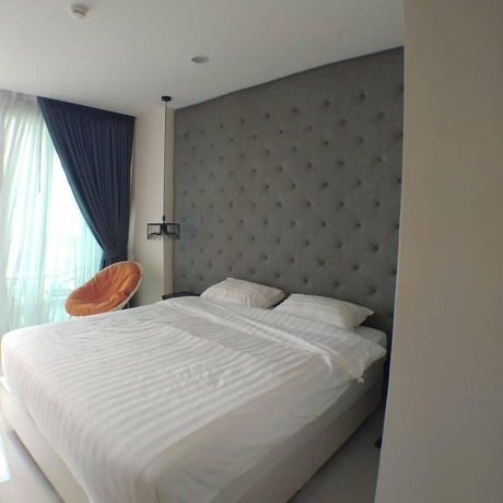 Imagen de la habitación del Hotel Riviera Pattaya Beach. Foto 19