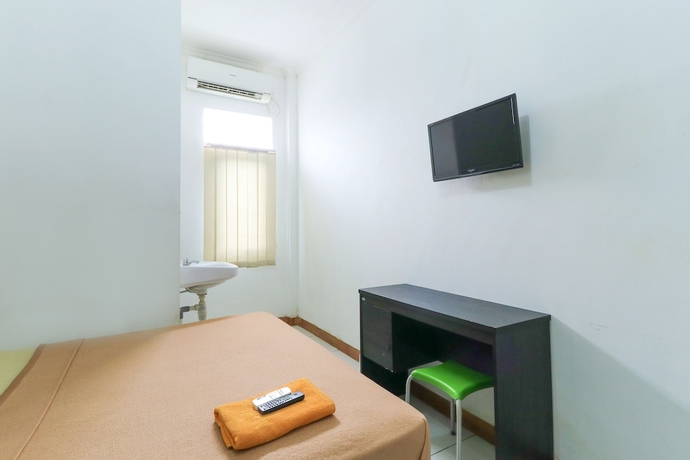 Imagen de la habitación del Hotel Riviera Residence, Balikpapan. Foto 6