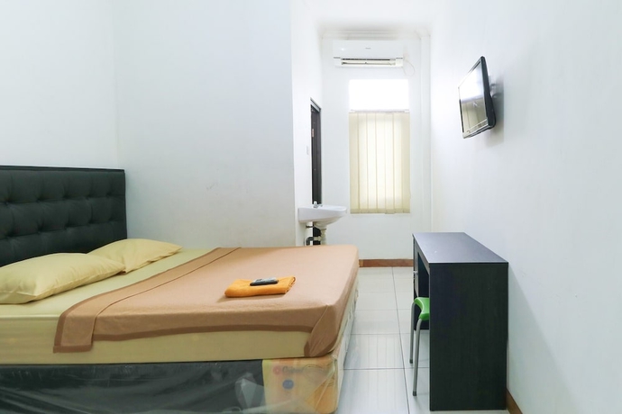 Imagen de la habitación del Hotel Riviera Residence, Balikpapan. Foto 7