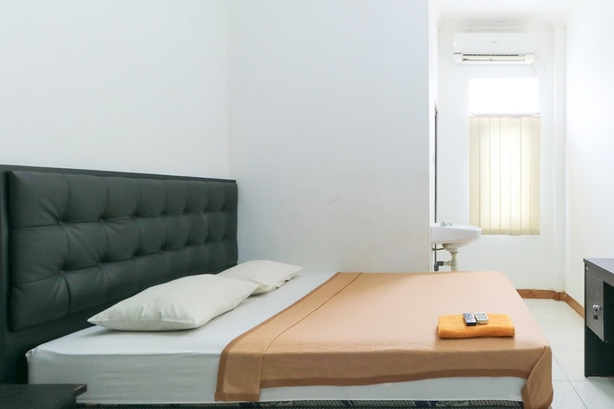 Imagen de la habitación del Hotel Riviera Residence, Balikpapan. Foto 8