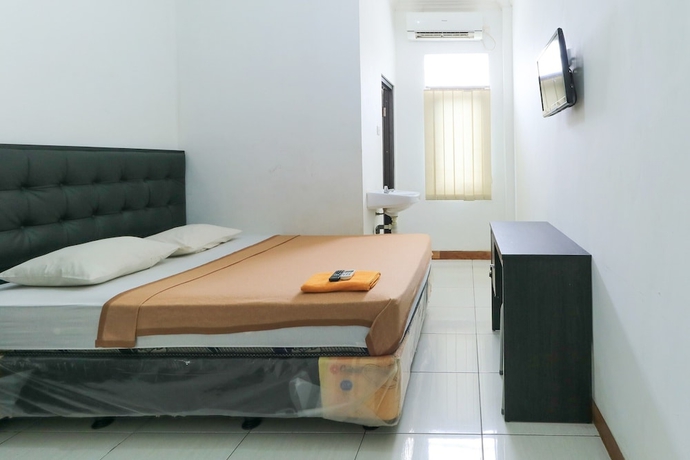 Imagen de la habitación del Hotel Riviera Residence, Balikpapan. Foto 12