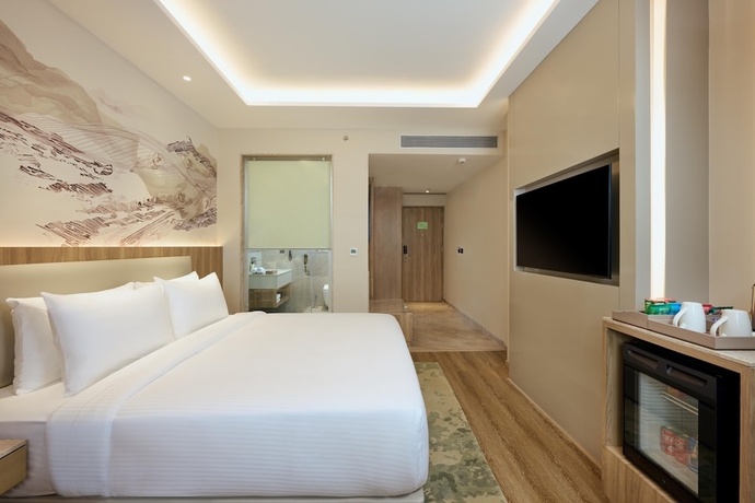 Imagen de la habitación del Hotel Riviera Sarovar Portico Pathankot. Foto 4