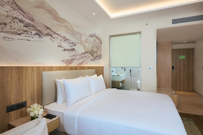 Imagen de la habitación del Hotel Riviera Sarovar Portico Pathankot. Foto 5