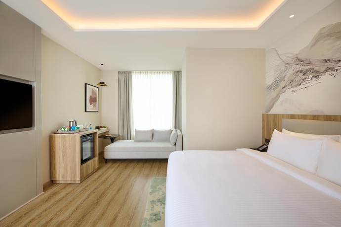 Imagen de la habitación del Hotel Riviera Sarovar Portico Pathankot. Foto 7