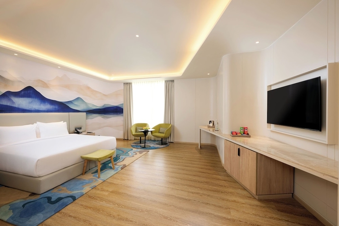 Imagen de la habitación del Hotel Riviera Sarovar Portico Pathankot. Foto 8