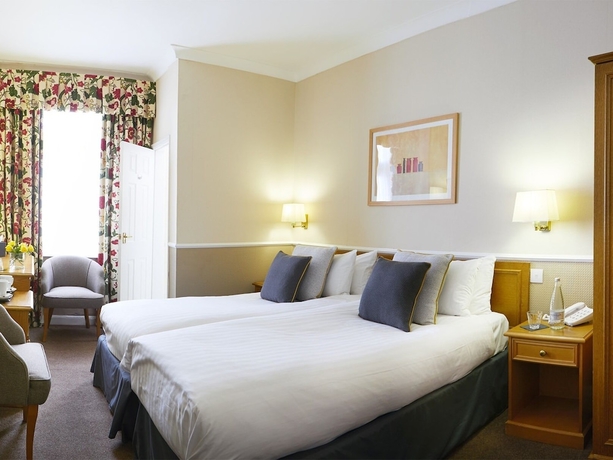 Imagen de la habitación del Hotel Riviera Town House. Foto 16