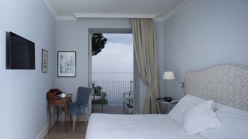 Imagen de la habitación del Hotel Riviera and Maximilians. Foto 7