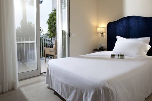 Imagen de la habitación del Hotel Riviera and Maximilians. Foto 10