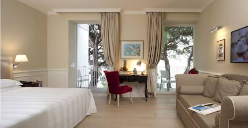 Imagen de la habitación del Hotel Riviera and Maximilians. Foto 12