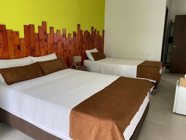 Imagen de la habitación del Hotel Riviere Boutique. Foto 15