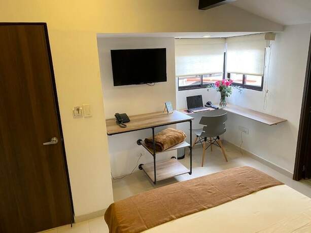 Imagen de la habitación del Hotel Riviere Boutique. Foto 18