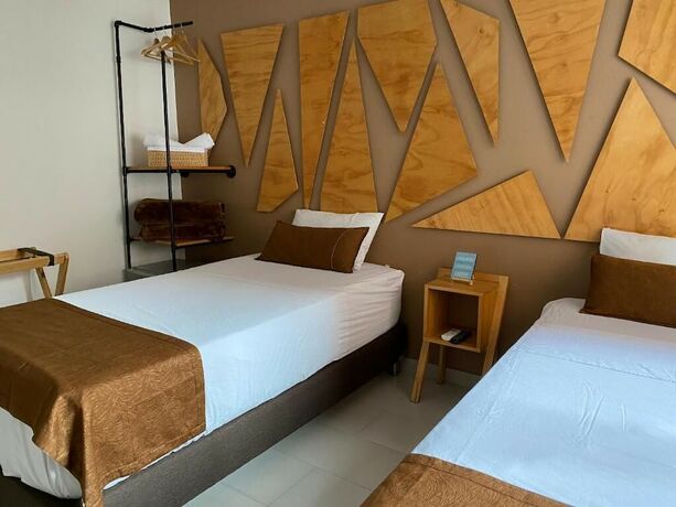 Imagen de la habitación del Hotel Riviere Boutique. Foto 19