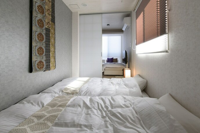Imagen de la habitación del Hotel Rivre Housai. Foto 14