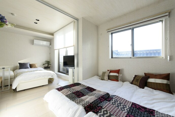 Imagen de la habitación del Hotel Rivre Housai. Foto 27