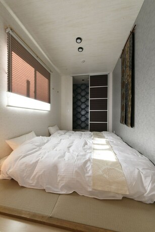 Imagen de la habitación del Hotel Rivre Housai. Foto 35
