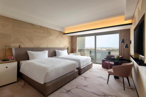 Imagen de la habitación del Hotel Rixos Gulf Doha. Foto 10