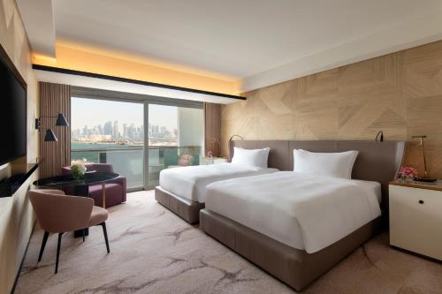 Imagen de la habitación del Hotel Rixos Gulf Doha. Foto 11