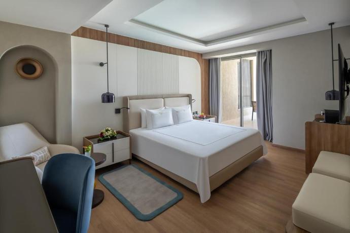 Imagen de la habitación del Hotel Rixos Premium Magawish Bay View. Foto 5