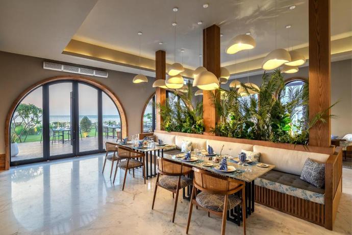 Imagen de la habitación del Hotel Rixos Premium Magawish Bay View. Foto 6