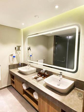 Imagen de la habitación del Hotel Rixos Premium Magawish Suites and Villas. Foto 13