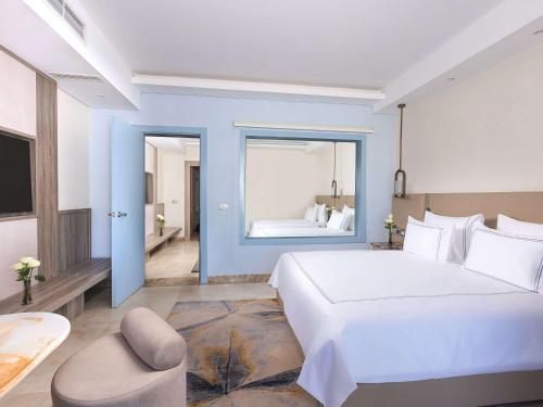 Imagen de la habitación del Hotel Rixos Radamis Sharm El Sheikh. Foto 12