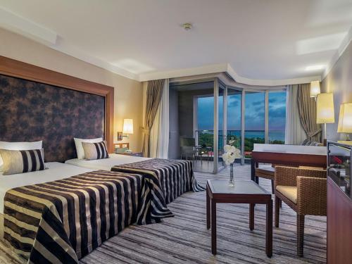 Imagen de la habitación del Hotel Rixos Sungate - The Land Of Legend Access. Foto 7