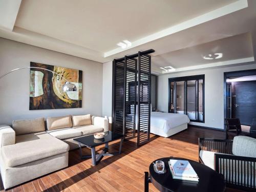 Imagen de la habitación del Hotel Rixos The Palm and Suites. Foto 8