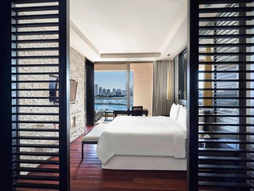 Imagen de la habitación del Hotel Rixos The Palm and Suites. Foto 11