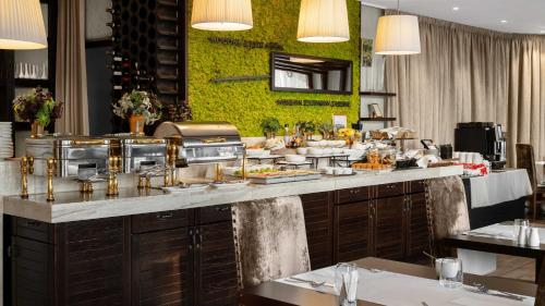 Imagen del bar/restaurante del Hotel Rixwell Collection Savoy Boutique. Foto 2