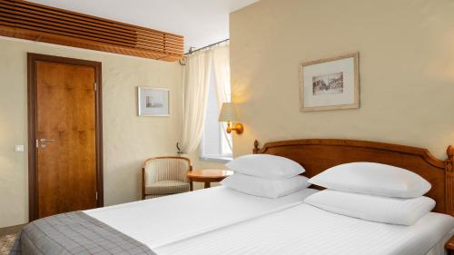 Imagen de la habitación del Hotel Rixwell Collection Savoy Boutique. Foto 7