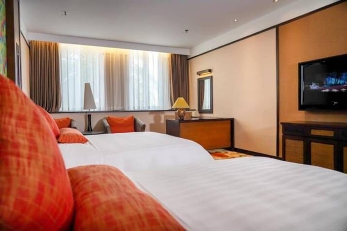 Imagen de la habitación del Hotel Riyuegu Hotsprings Resort. Foto 9