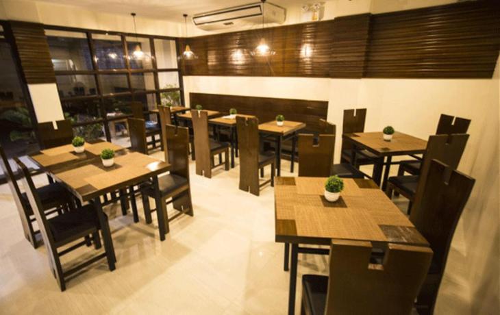 Imagen del bar/restaurante del Hotel Rizmy Apartment Hotel. Foto 6