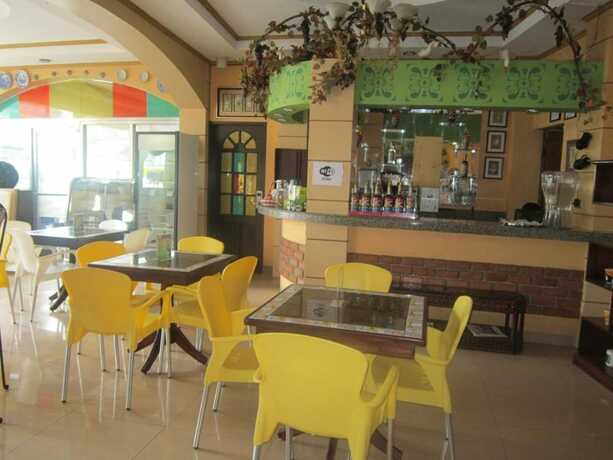 Imagen del bar/restaurante del Hotel Rm Guest House. Foto 17