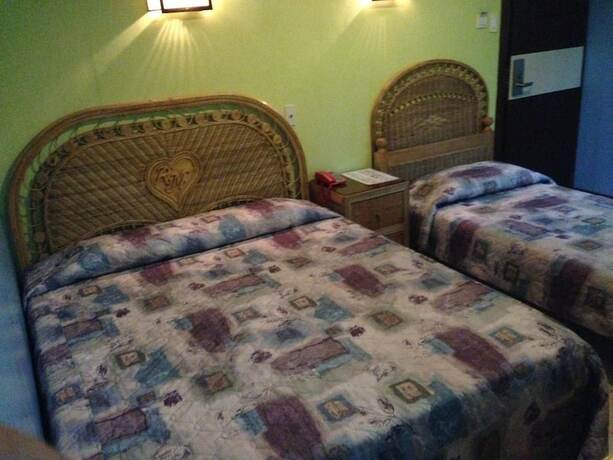 Imagen de la habitación del Hotel Rm Guest House. Foto 21