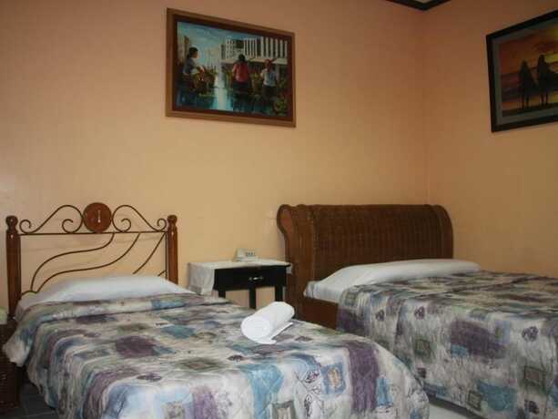 Imagen de la habitación del Hotel Rm Guest House. Foto 22