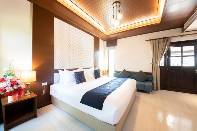 Imagen de la habitación del Hotel Rnana Grand. Foto 11