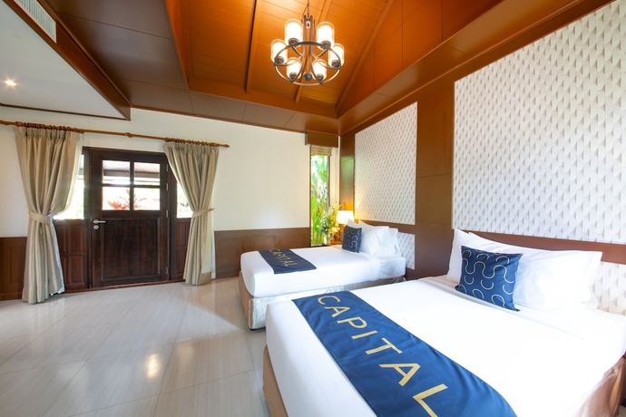 Imagen de la habitación del Hotel Rnana Grand. Foto 13