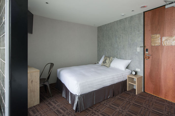 Imagen de la habitación del Hotel Roaders Zhonghua. Foto 6