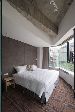 Imagen de la habitación del Hotel Roaders Zhonghua. Foto 7