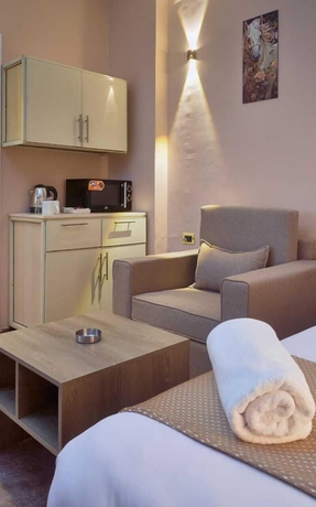Imagen de la habitación del Hotel Roadhouse New Cairo Residence. Foto 15