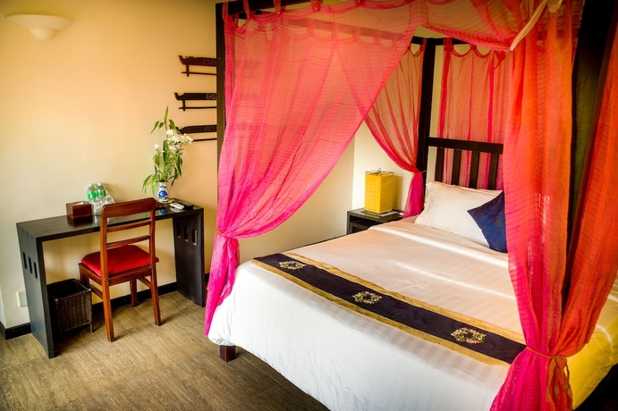 Imagen de la habitación del Hotel Robam Inn. Foto 8