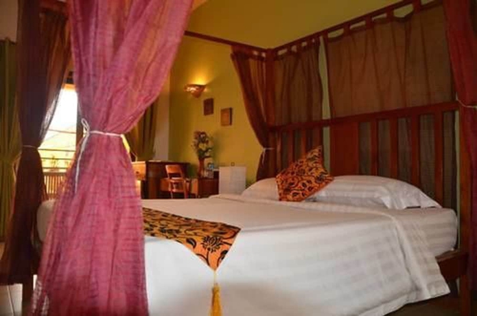 Imagen de la habitación del Hotel Robam Inn. Foto 10