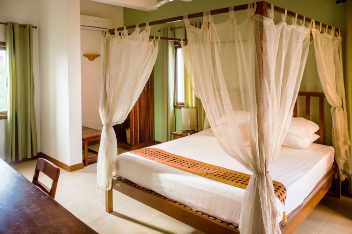 Imagen de la habitación del Hotel Robam Inn. Foto 12