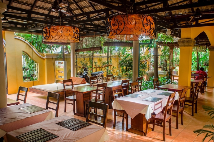 Imagen del bar/restaurante del Hotel Robam Inn. Foto 6